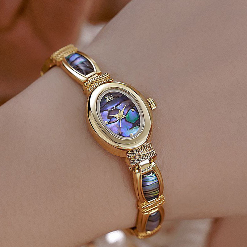 นาฬิกาข้อมือผู้หญิง หน้าปัดรูป - Luxury Zone บทวิจารณ์และราคา